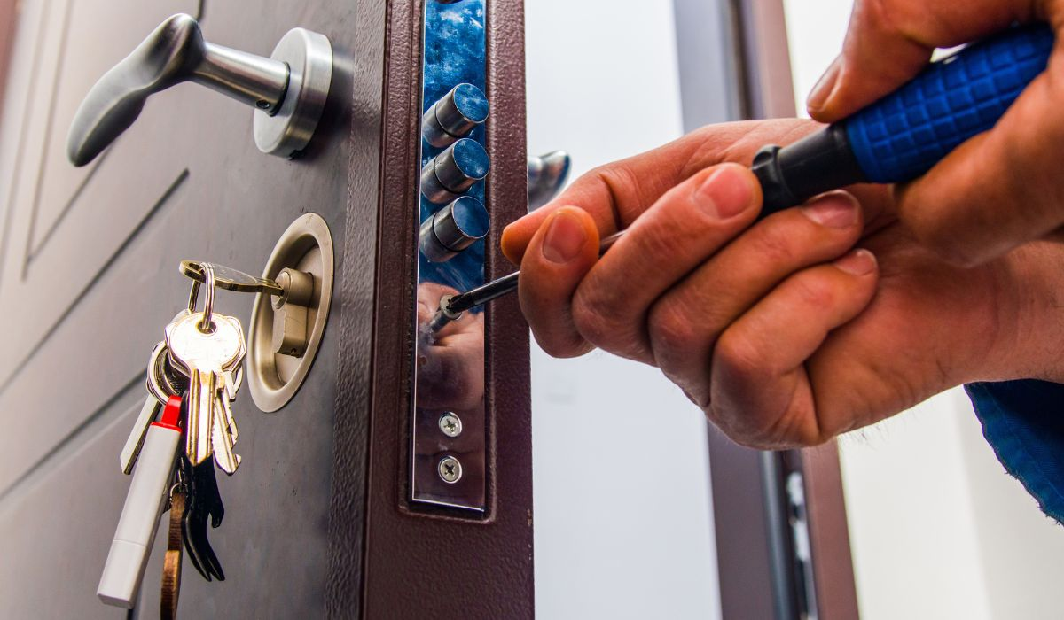 Local Bensalem locksmith technician working from a fully equipped mobile van on a residential street