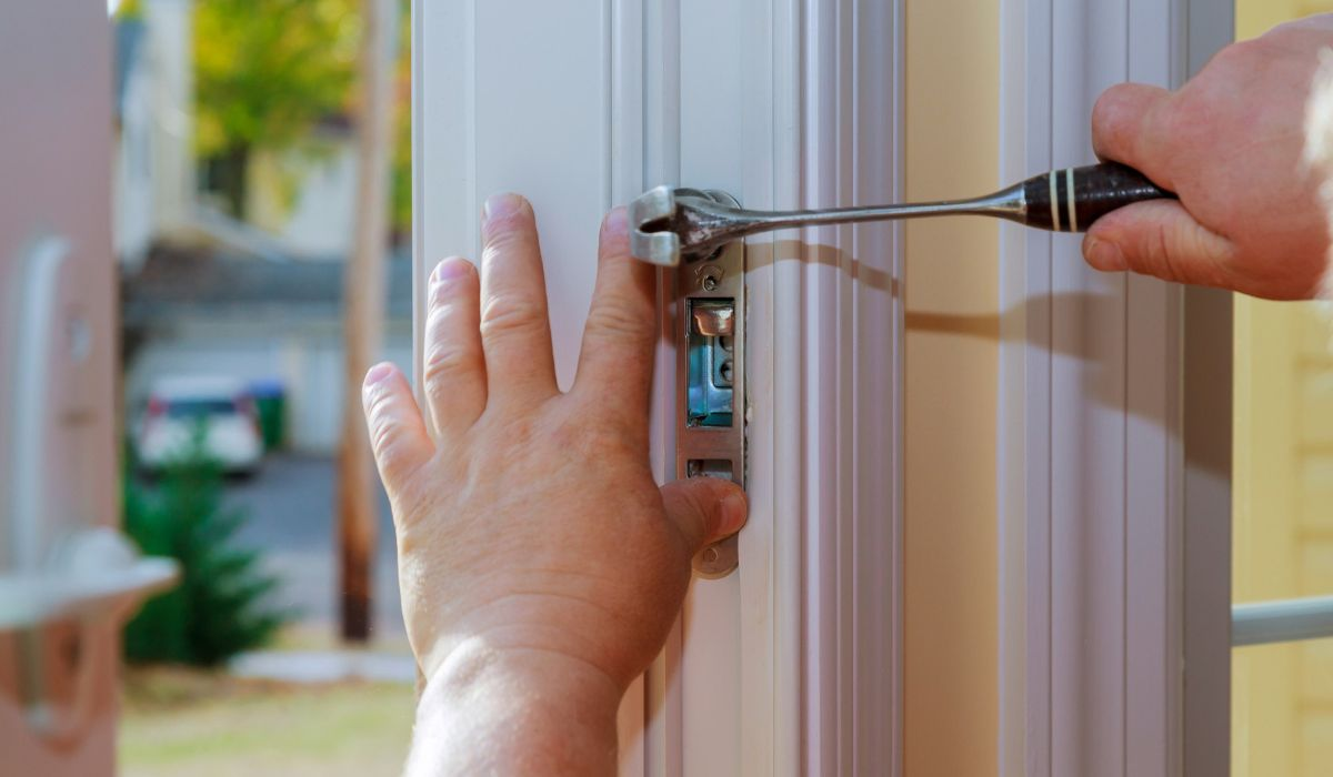 Local Bensalem locksmith technician working from a fully equipped mobile van on a residential street